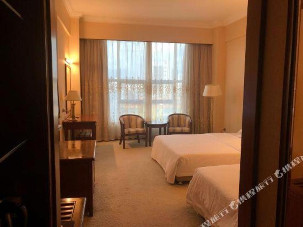 Fenggang Gladden Hotel Tiantangwei Extérieur photo