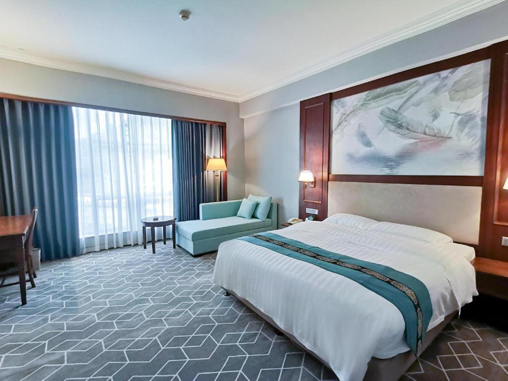 Fenggang Gladden Hotel Tiantangwei Extérieur photo