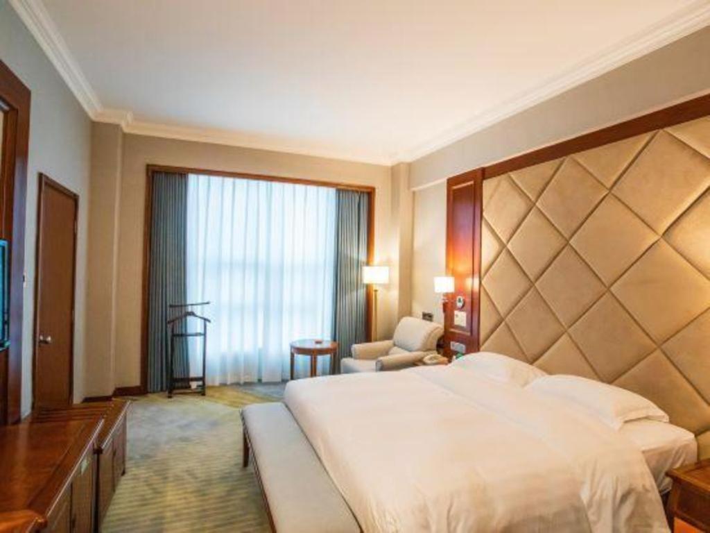 Fenggang Gladden Hotel Tiantangwei Extérieur photo