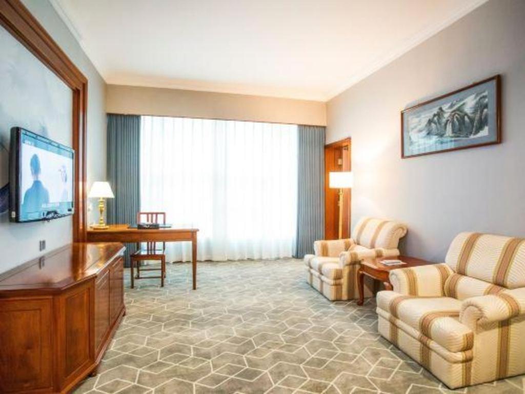 Fenggang Gladden Hotel Tiantangwei Extérieur photo
