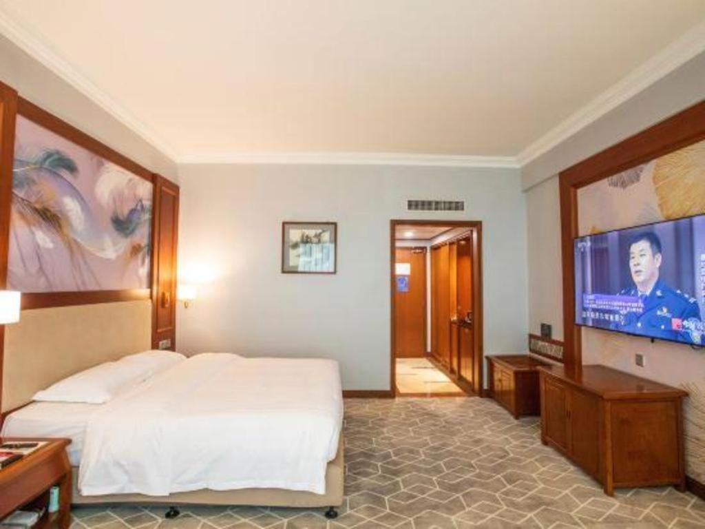 Fenggang Gladden Hotel Tiantangwei Extérieur photo
