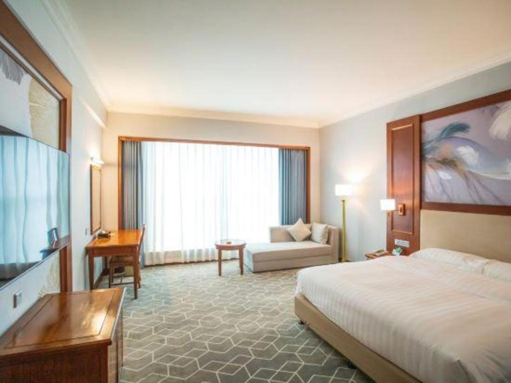 Fenggang Gladden Hotel Tiantangwei Extérieur photo