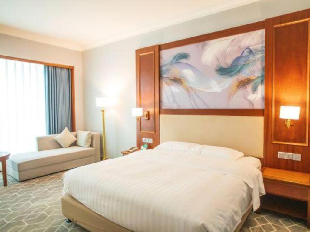 Fenggang Gladden Hotel Tiantangwei Extérieur photo