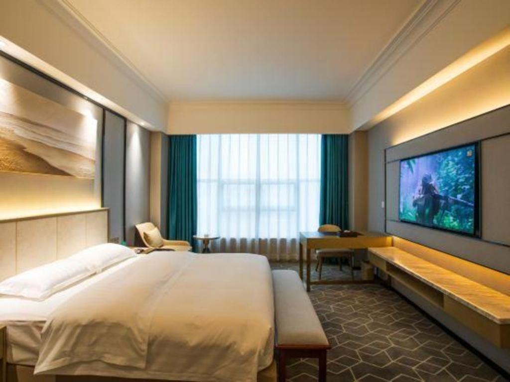 Fenggang Gladden Hotel Tiantangwei Extérieur photo