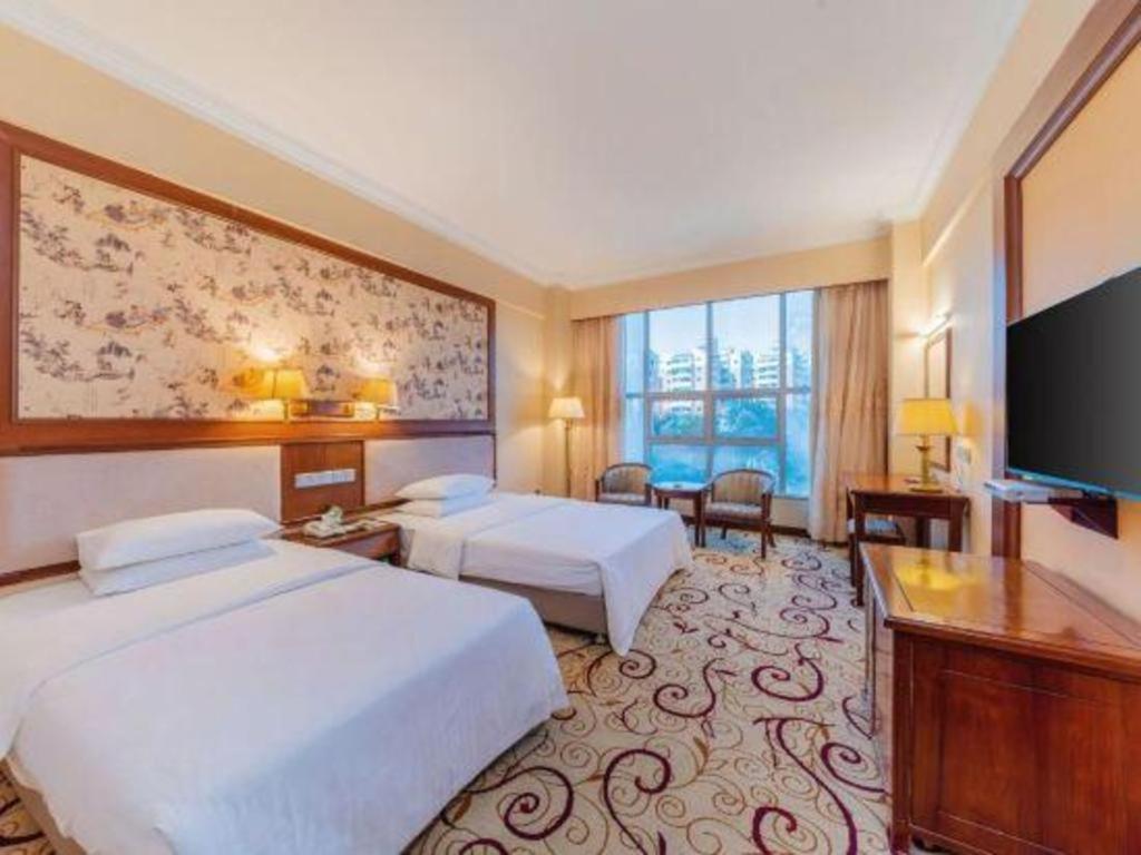 Fenggang Gladden Hotel Tiantangwei Extérieur photo