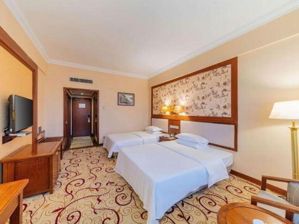 Fenggang Gladden Hotel Tiantangwei Extérieur photo
