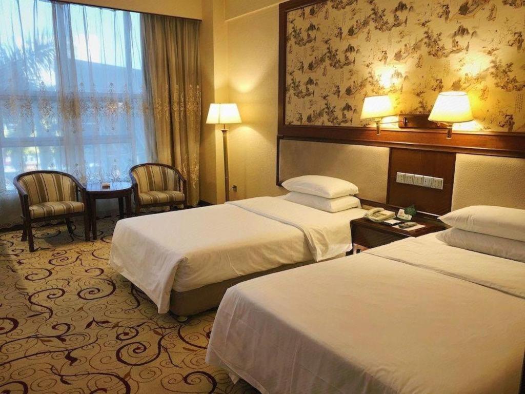 Fenggang Gladden Hotel Tiantangwei Extérieur photo