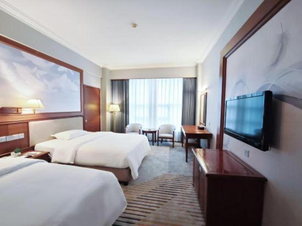 Fenggang Gladden Hotel Tiantangwei Extérieur photo