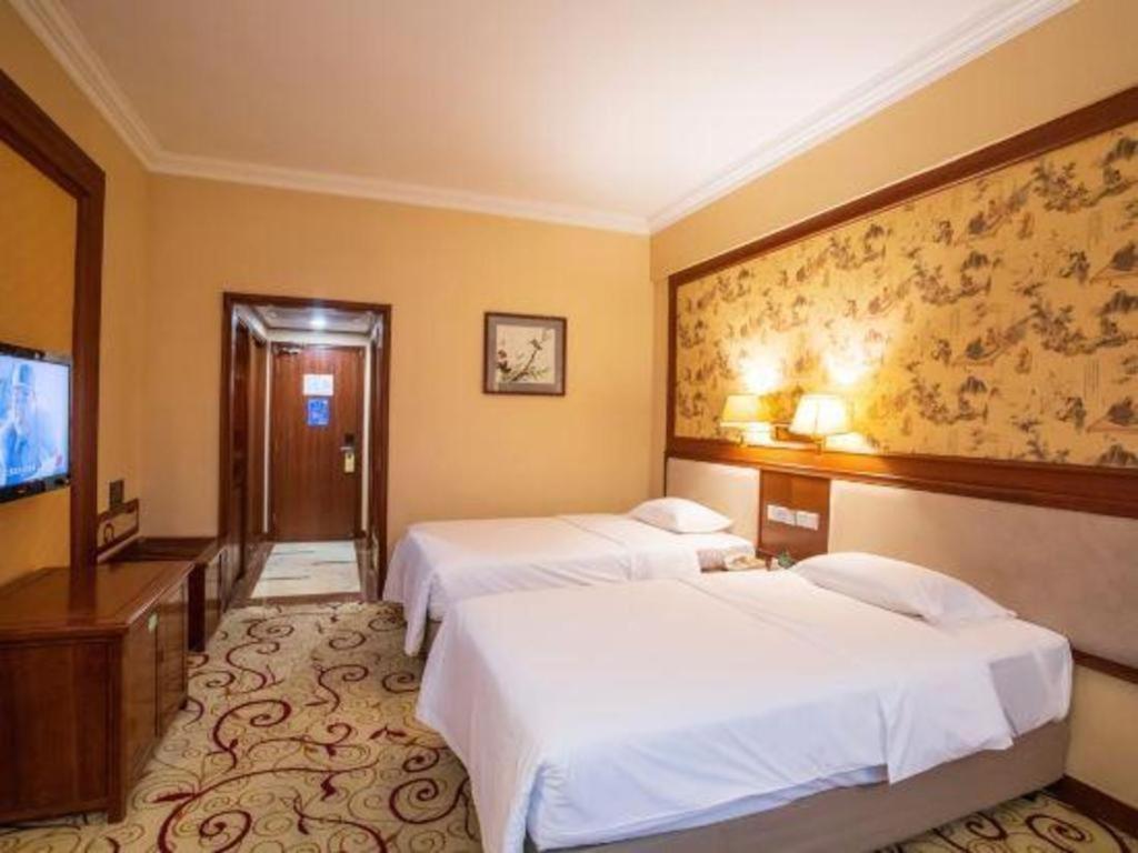 Fenggang Gladden Hotel Tiantangwei Extérieur photo