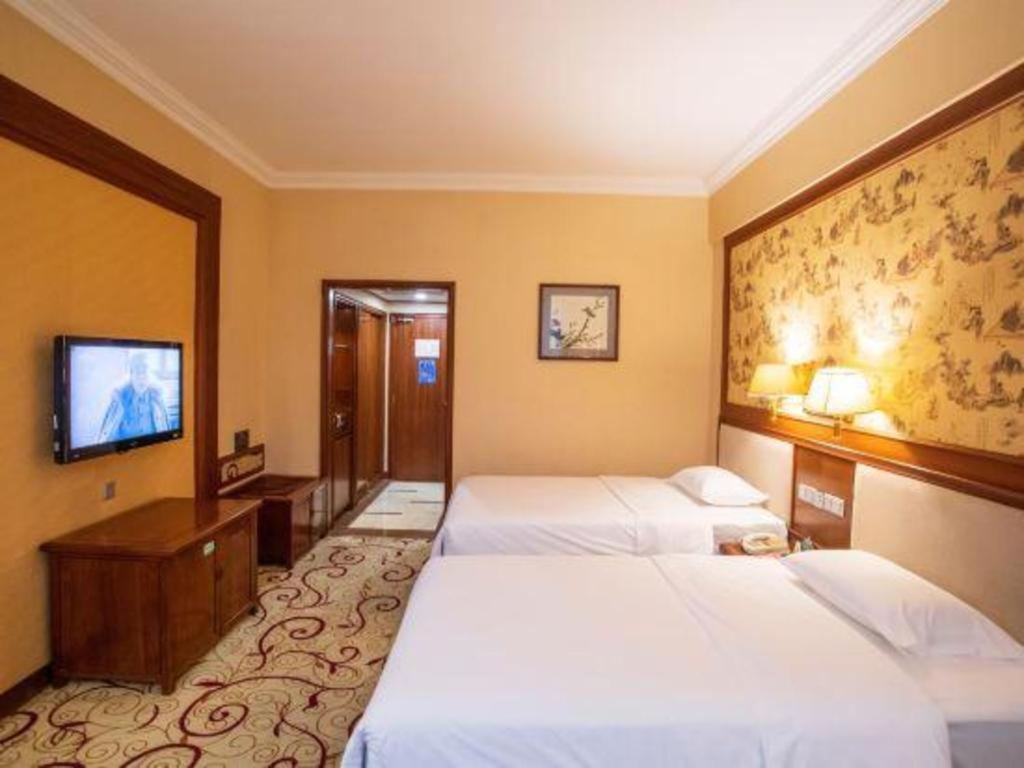 Fenggang Gladden Hotel Tiantangwei Extérieur photo