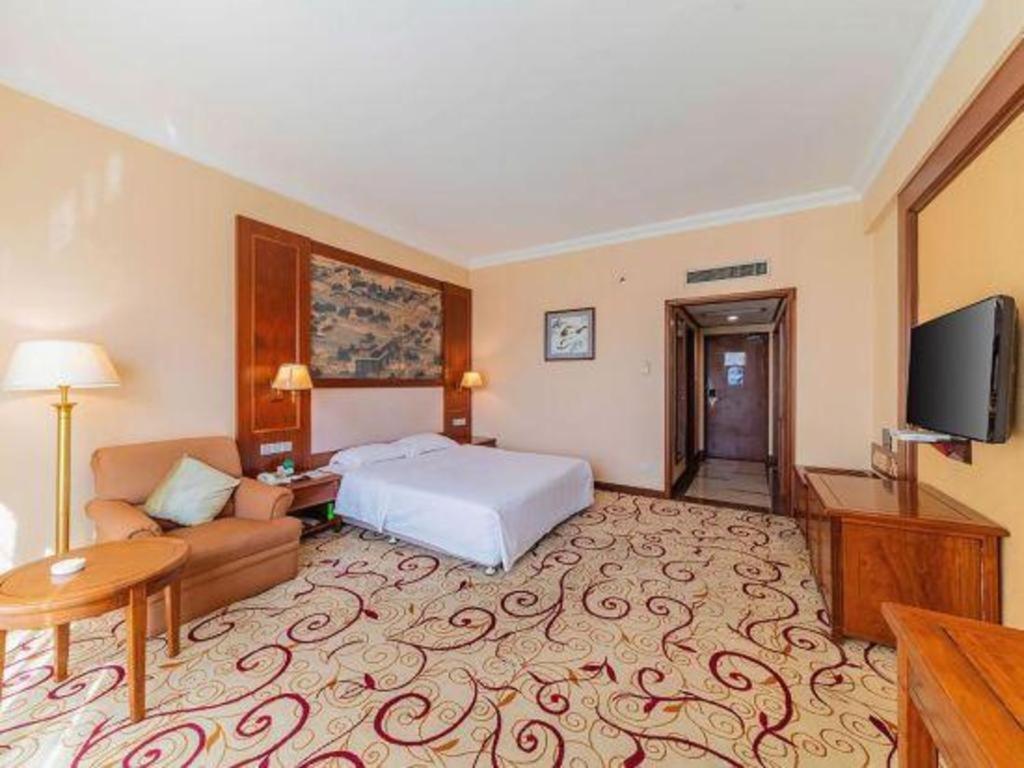 Fenggang Gladden Hotel Tiantangwei Extérieur photo