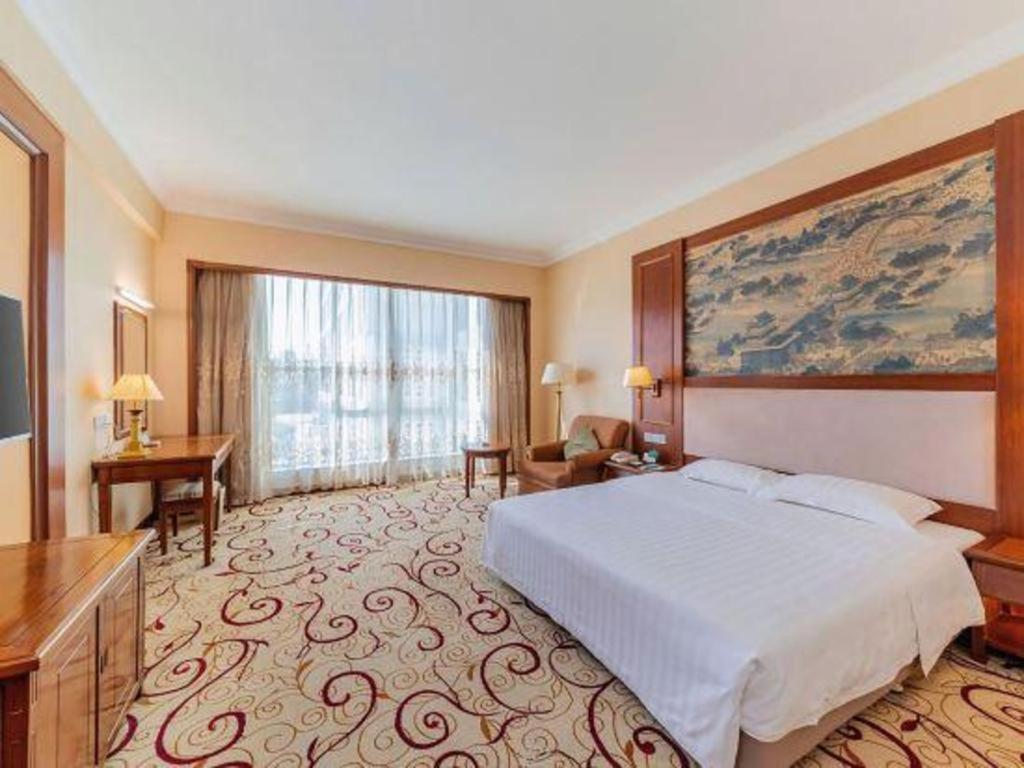 Fenggang Gladden Hotel Tiantangwei Extérieur photo