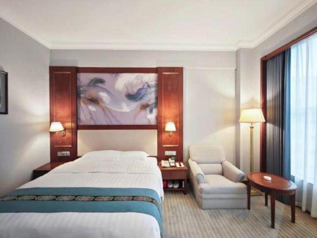 Fenggang Gladden Hotel Tiantangwei Extérieur photo